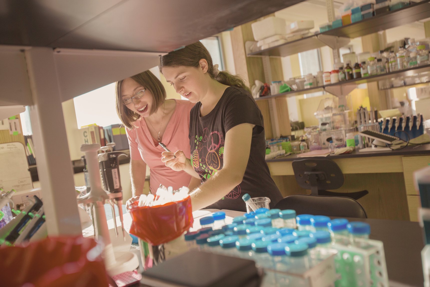 two individuals working in a laboratory