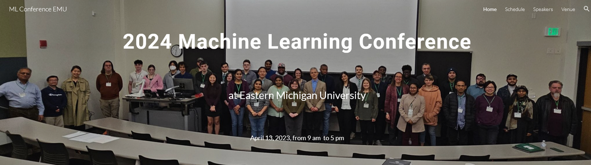 the machine learning conference homepage banner showing a large group photo of people posing in a classroom