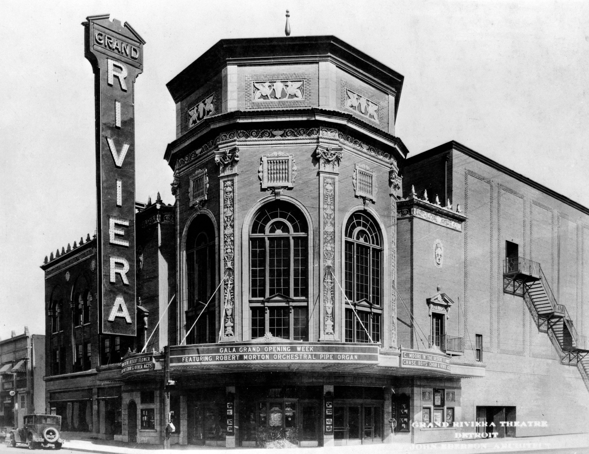 an old black and white photo of a theater