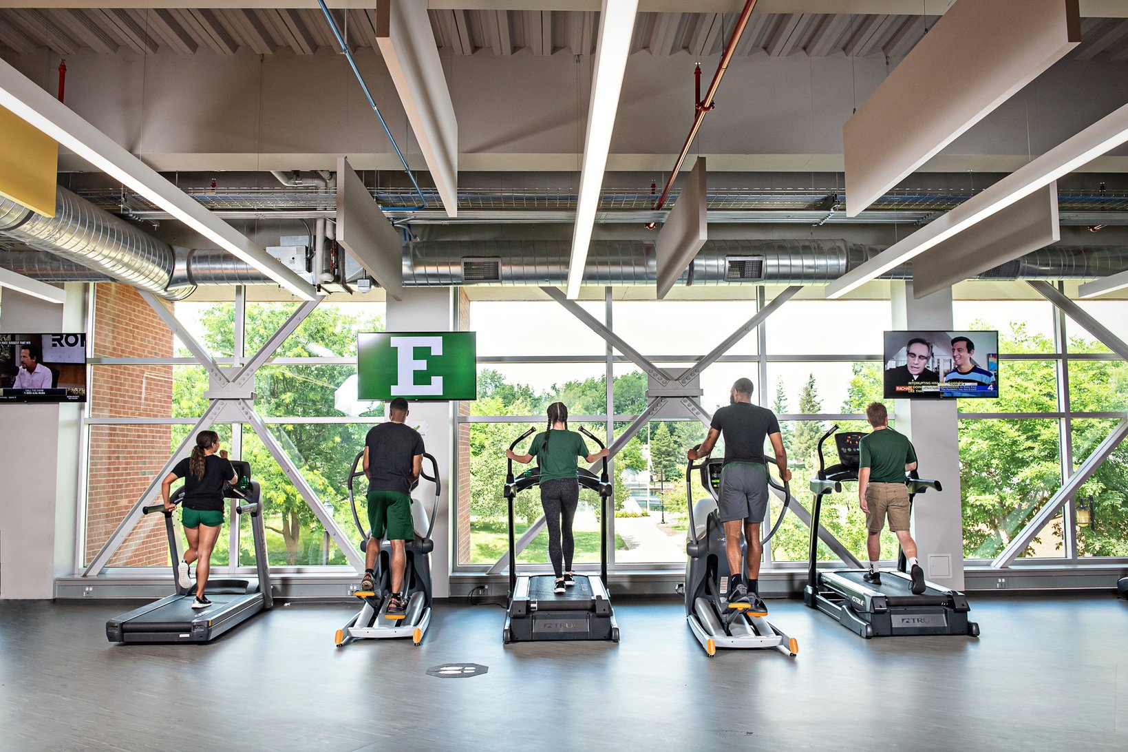 Students run on treadmills in the EMU Rec Im