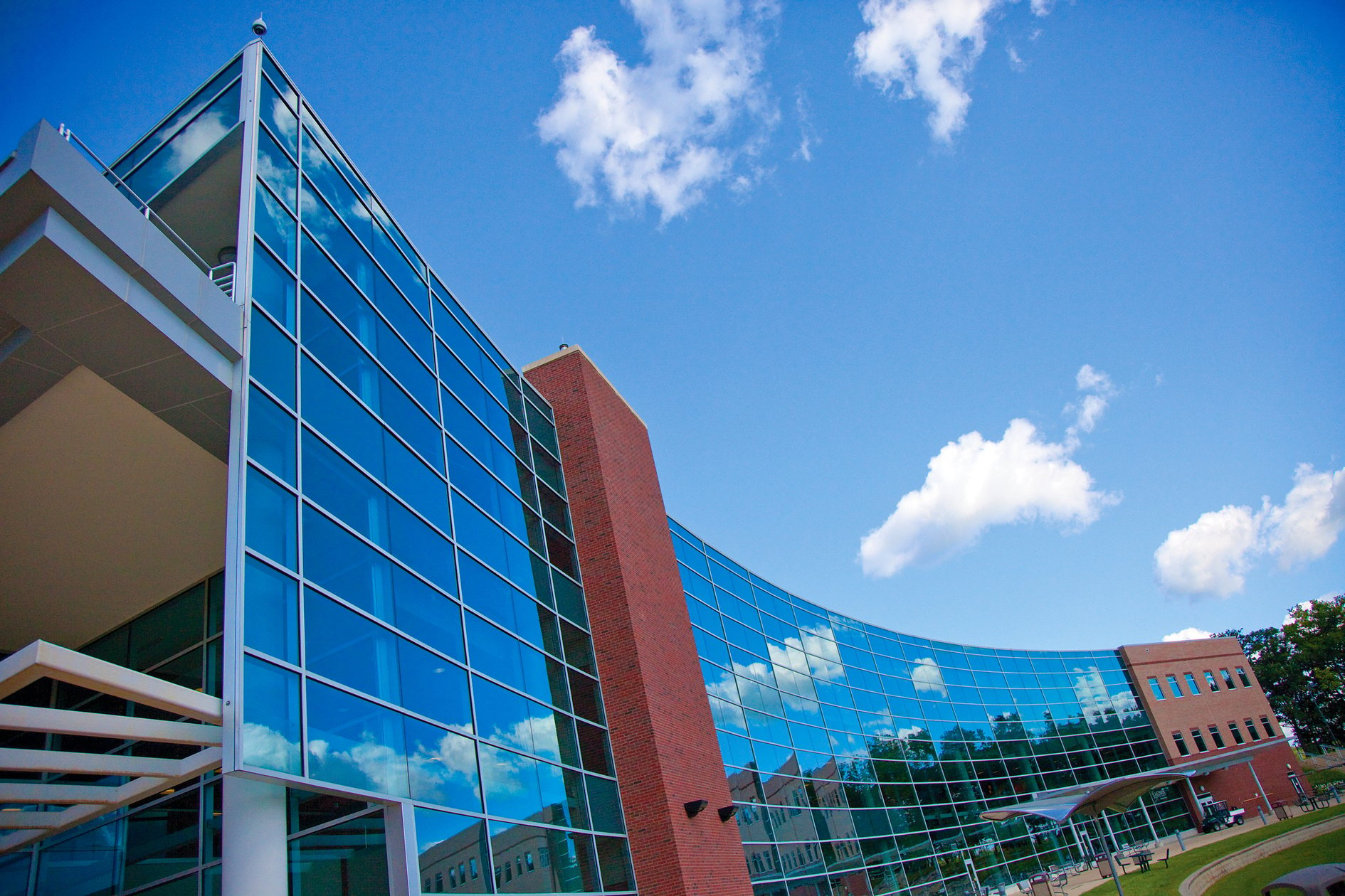 An upward shot of the glass front of the Student Center